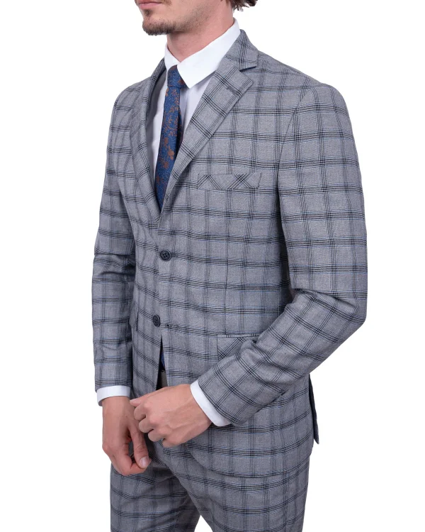 Szara marynarka w granatową kratę na modelu, ujęcie z boku