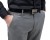 Zbliżenie na kieszenie i materiał spodni Slim Fit