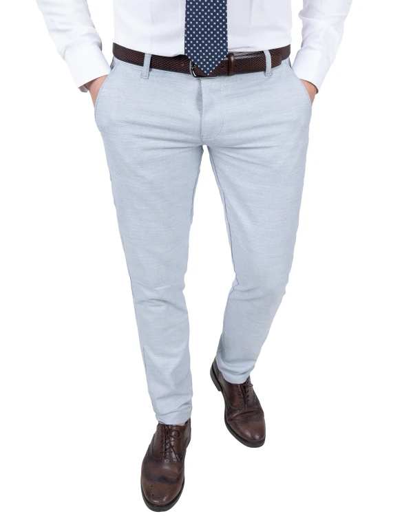 Spodnie męskie szaroniebieskie wizytowe Slim Fit - sylwetka w ruchu z przodu, Szafler